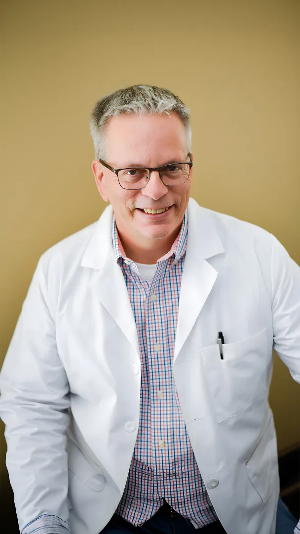 Dr. Kevin Conners reviewing an alternative cancer patient case